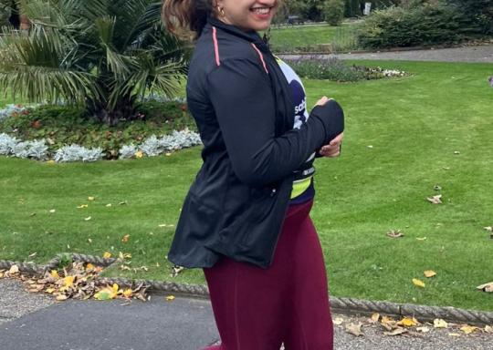 Image of Aasia running in a park