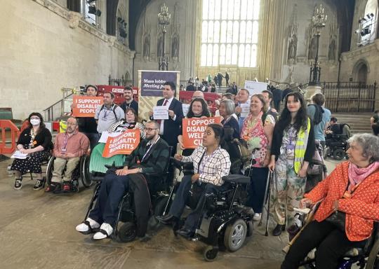 Image of Disabled people in parliament before lobbying MPs