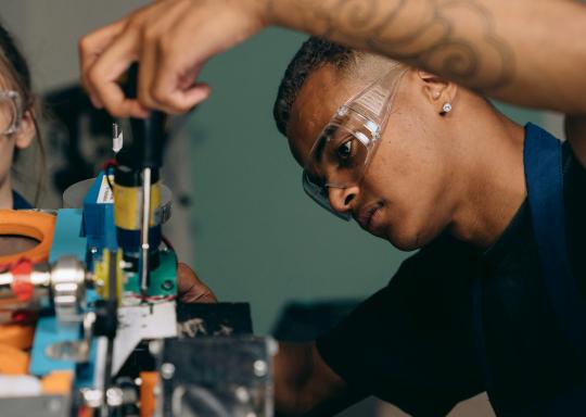 Image of a young man on an electrician cource